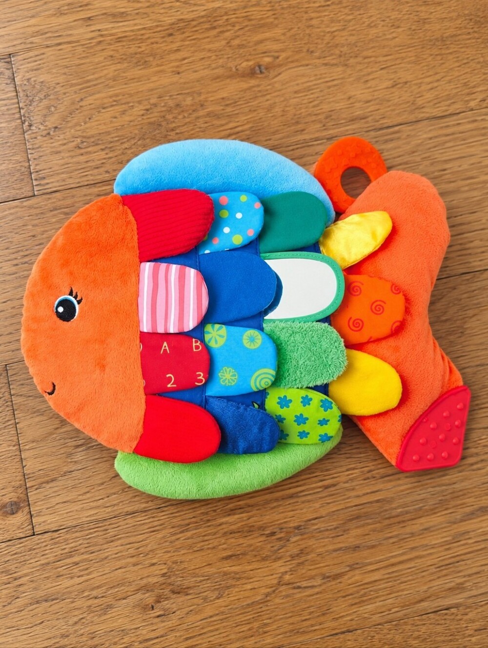 Melissa & Doug Plush Colorful Baby Fish Flip Flap Sensory Toy